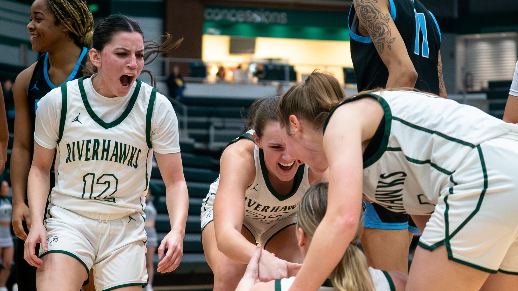 Women's Basketball Team Celebrating